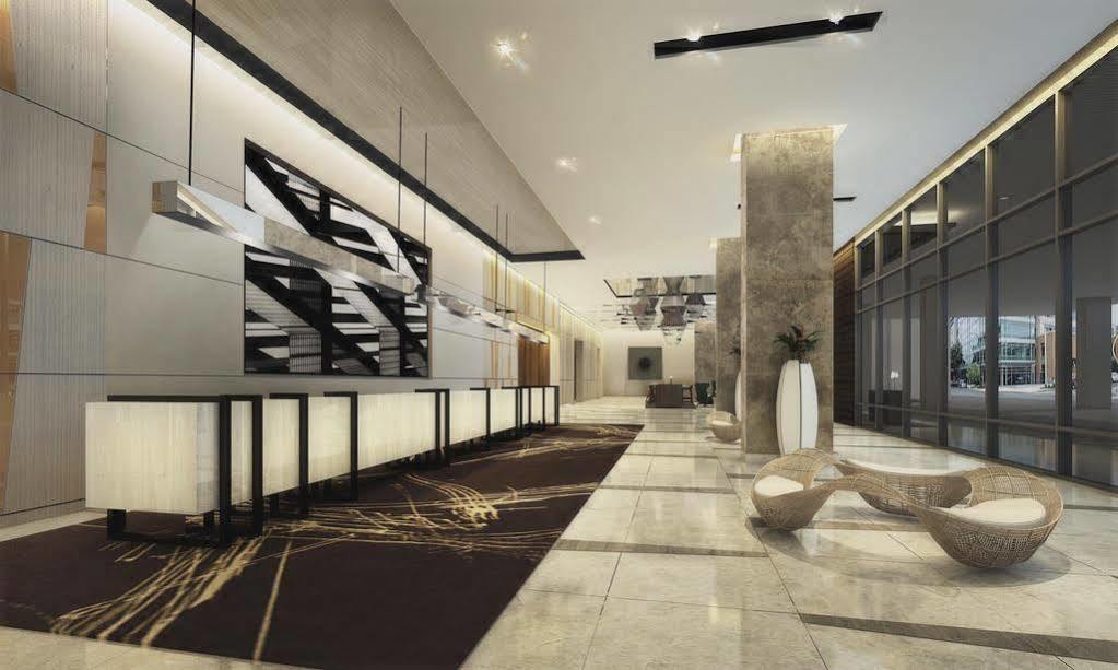 Seda Vertis North Quezon City Esterno foto The lobby of the hotel